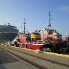  Tugs "Fournier Boys" and "Winslow C Kelsey" await sailing of Auto Carrier "Bangkok Highway" at Davisville, RI Car Port Pier 2, July 2010.