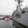 Tug "Fort Point" assisting USS John L. Hall, Bucksport, Maine. July 29, 2011