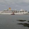 Tug "Winslow C. Kelsey" salutes cruise ship Aurora while escorting outbound Portland Harbor.